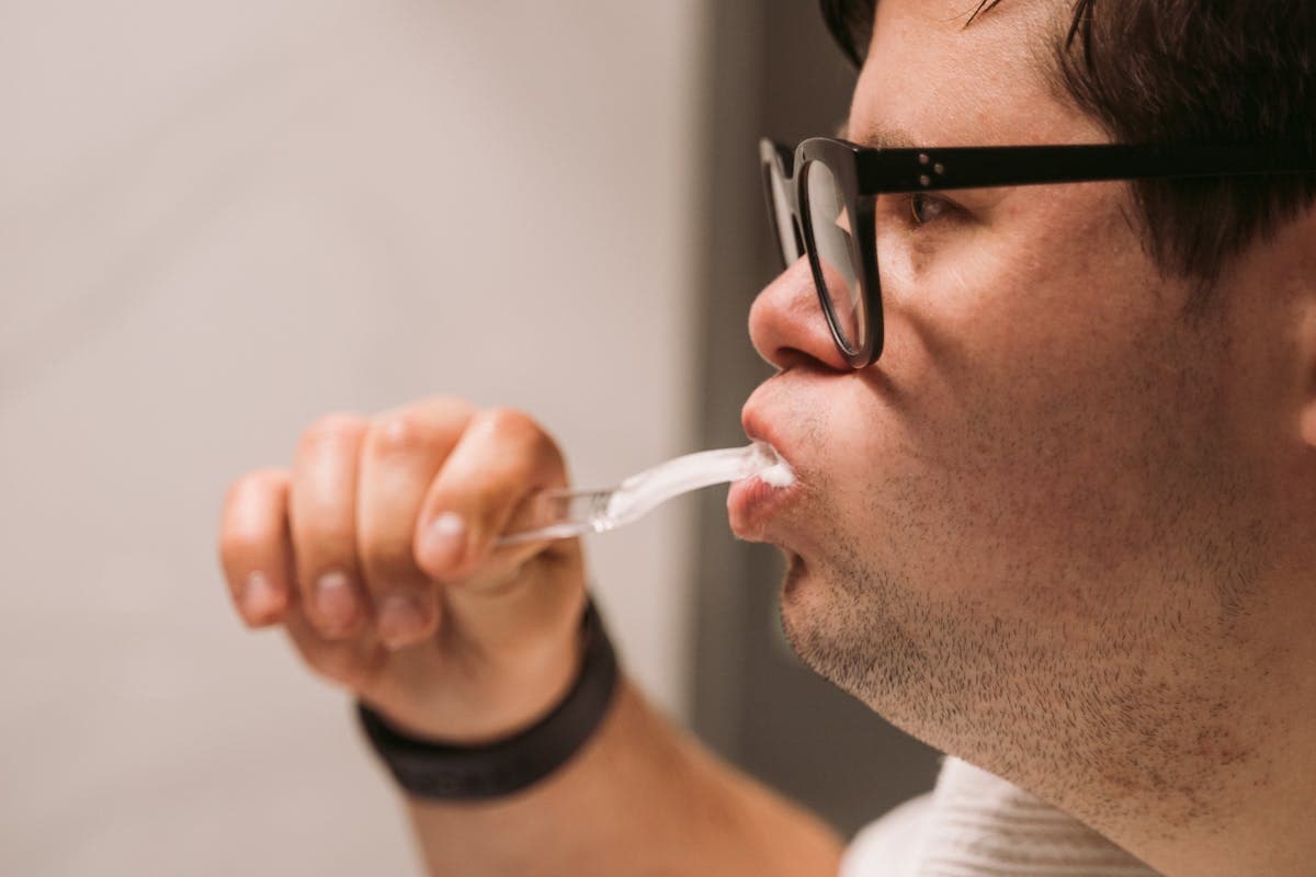 Man Brushing His Teeth