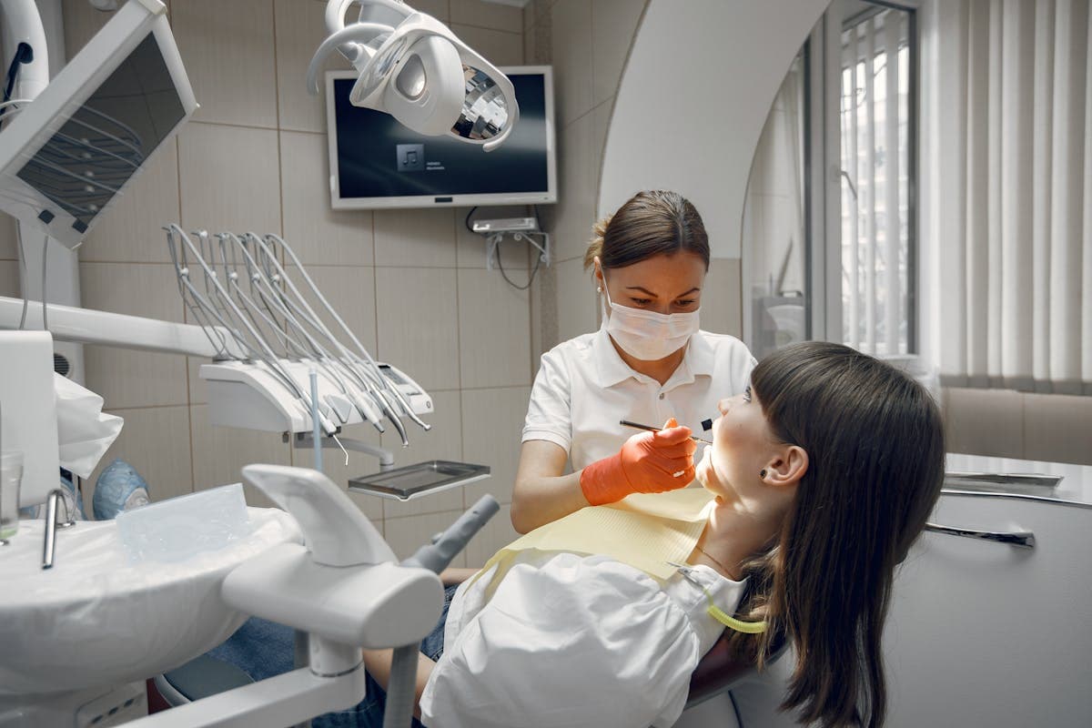 A Dentist Treating a Patient.jpg