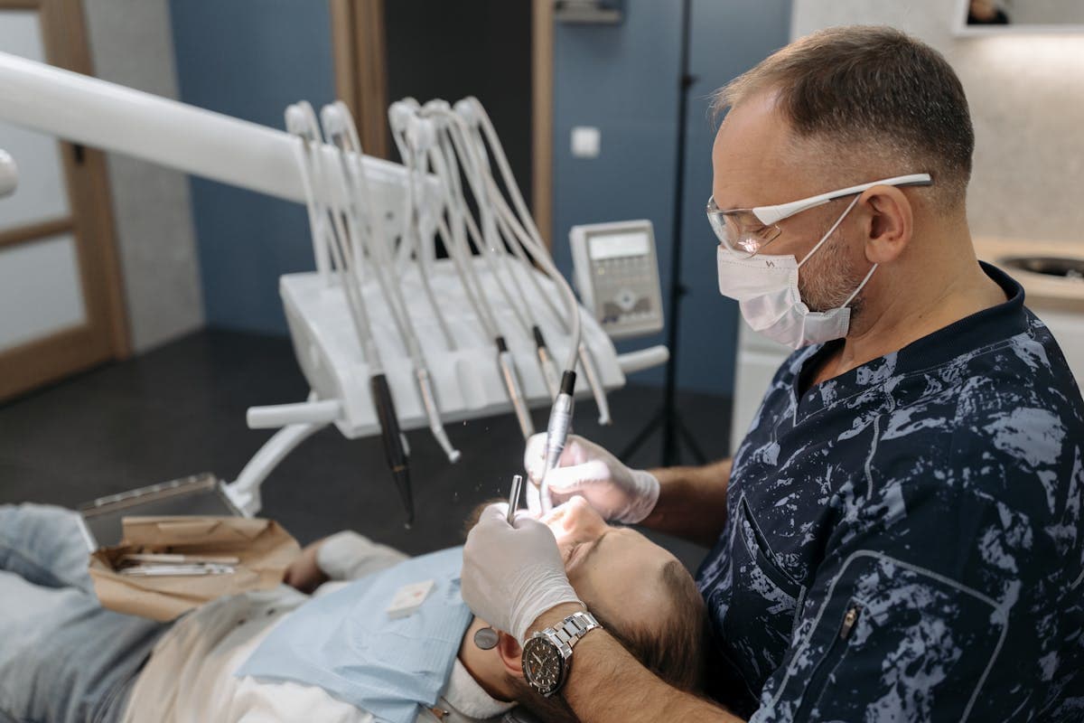 Dentist Checking a Patient's Teeth.jpg