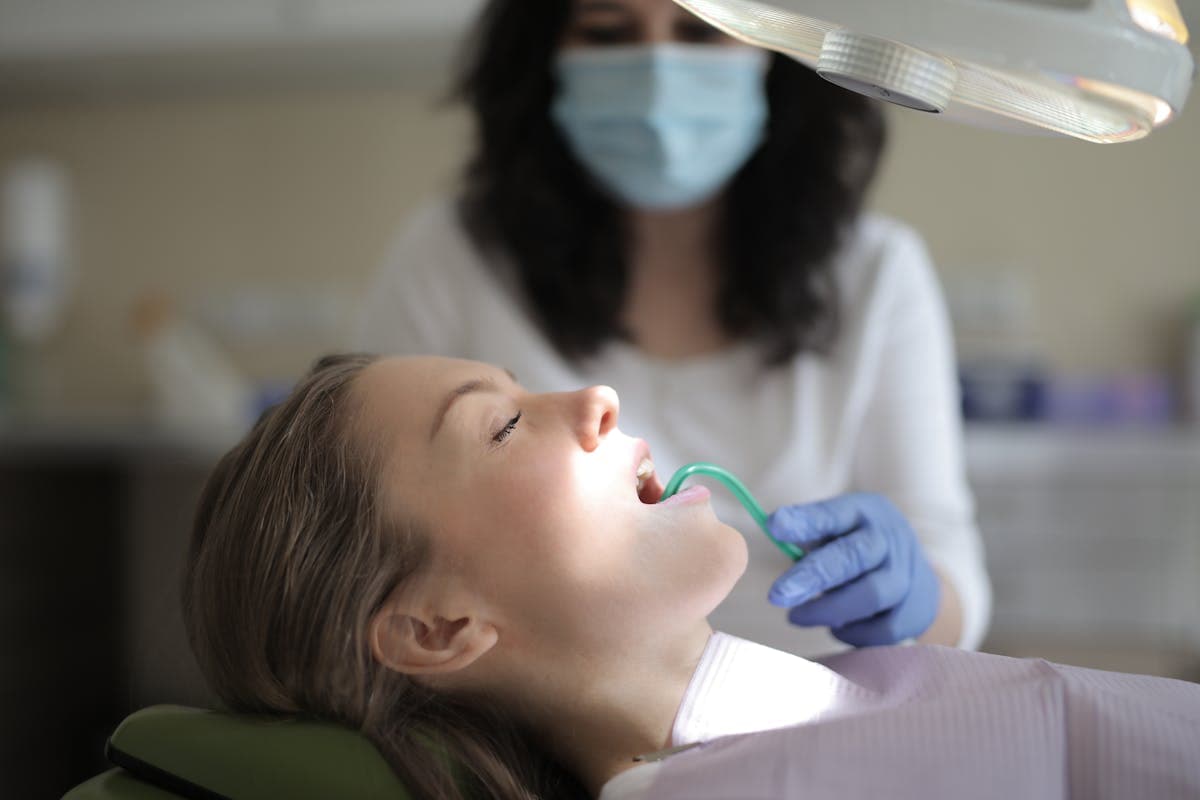 Female patient healing teeth during medical procedure.jpg