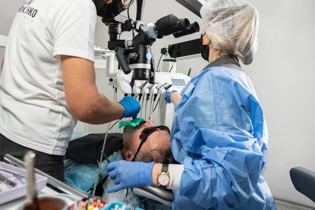 Women Dentists with Patient