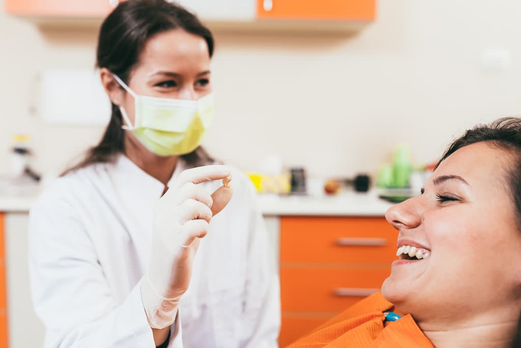 Patient after tooth extraction
