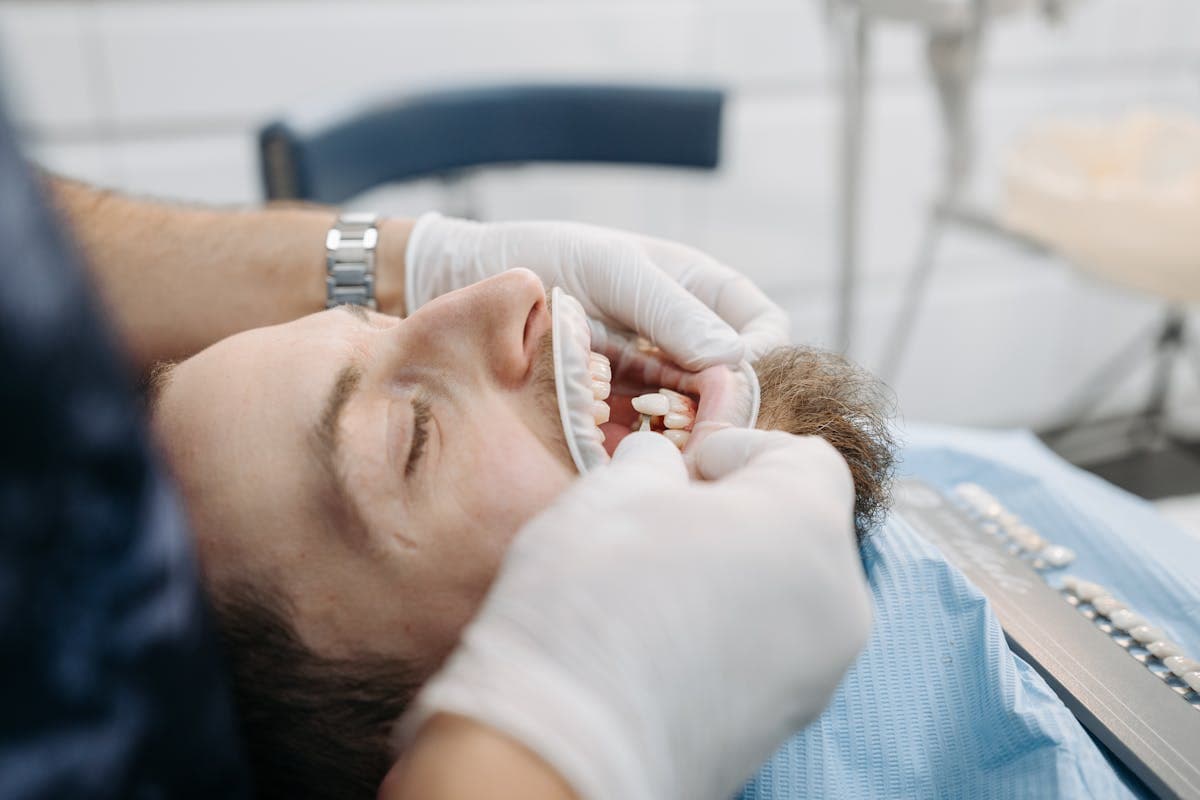 Man Opening his Mouth at the Dentists Office.jpg