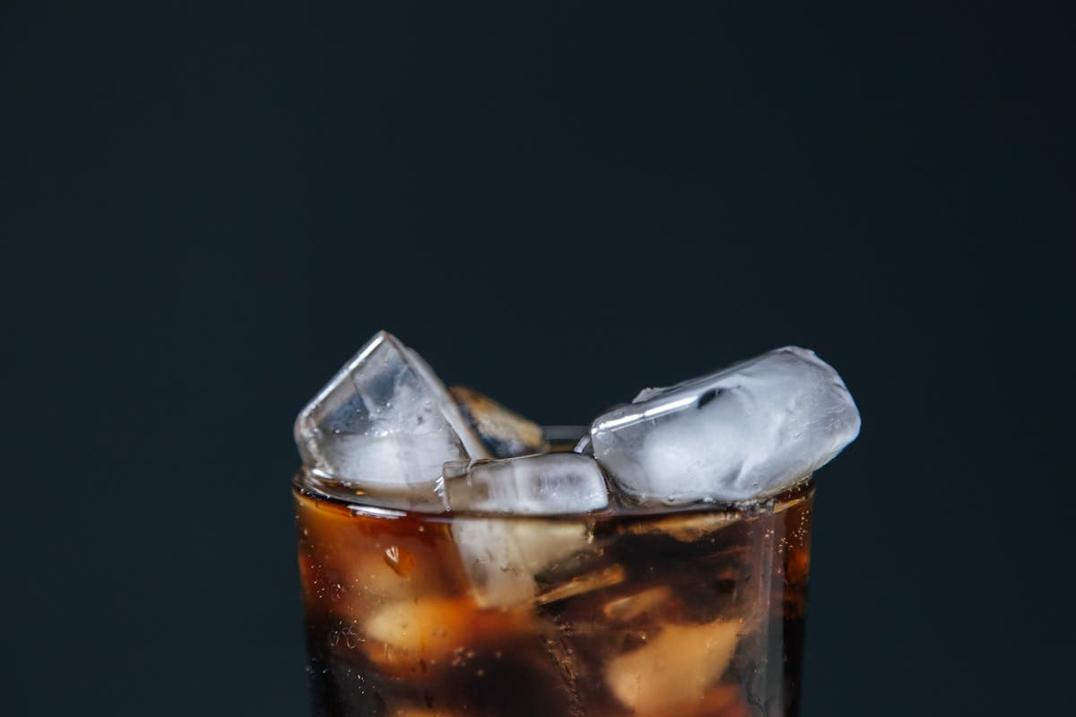 Close-Up Shot of a Soft Drink with Ice Cubes.jpg