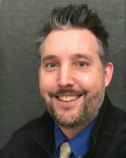 Dr. Jarom Aston